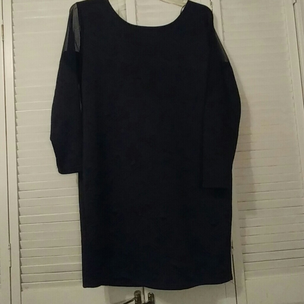 Plus size. Simple sexy black mini dress.